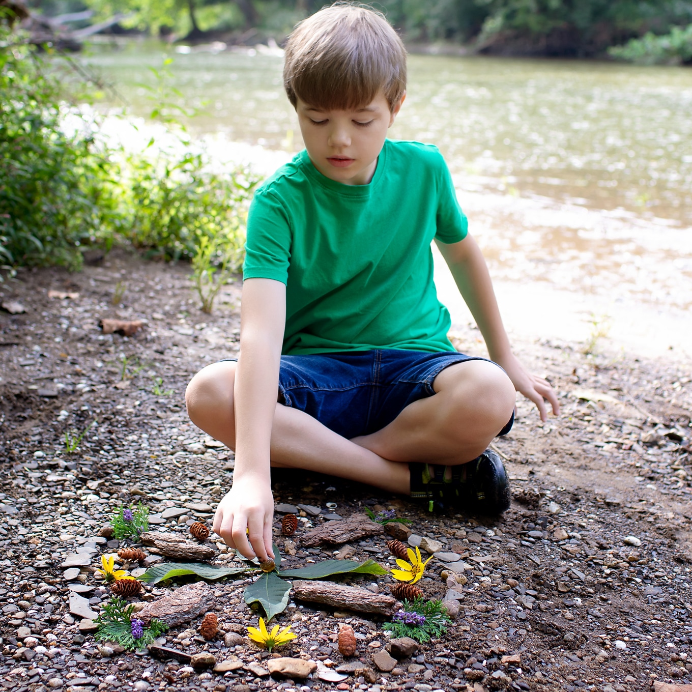 Child Creating a Nature Mandala - From the Book Sticks and Stones